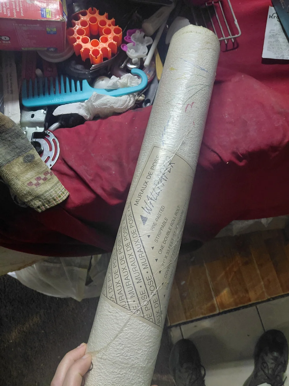 double roll of pre-pasted, strippable wallpaper, specifically identified as the